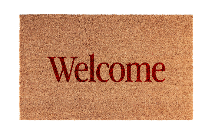 A doormat reading Welcome